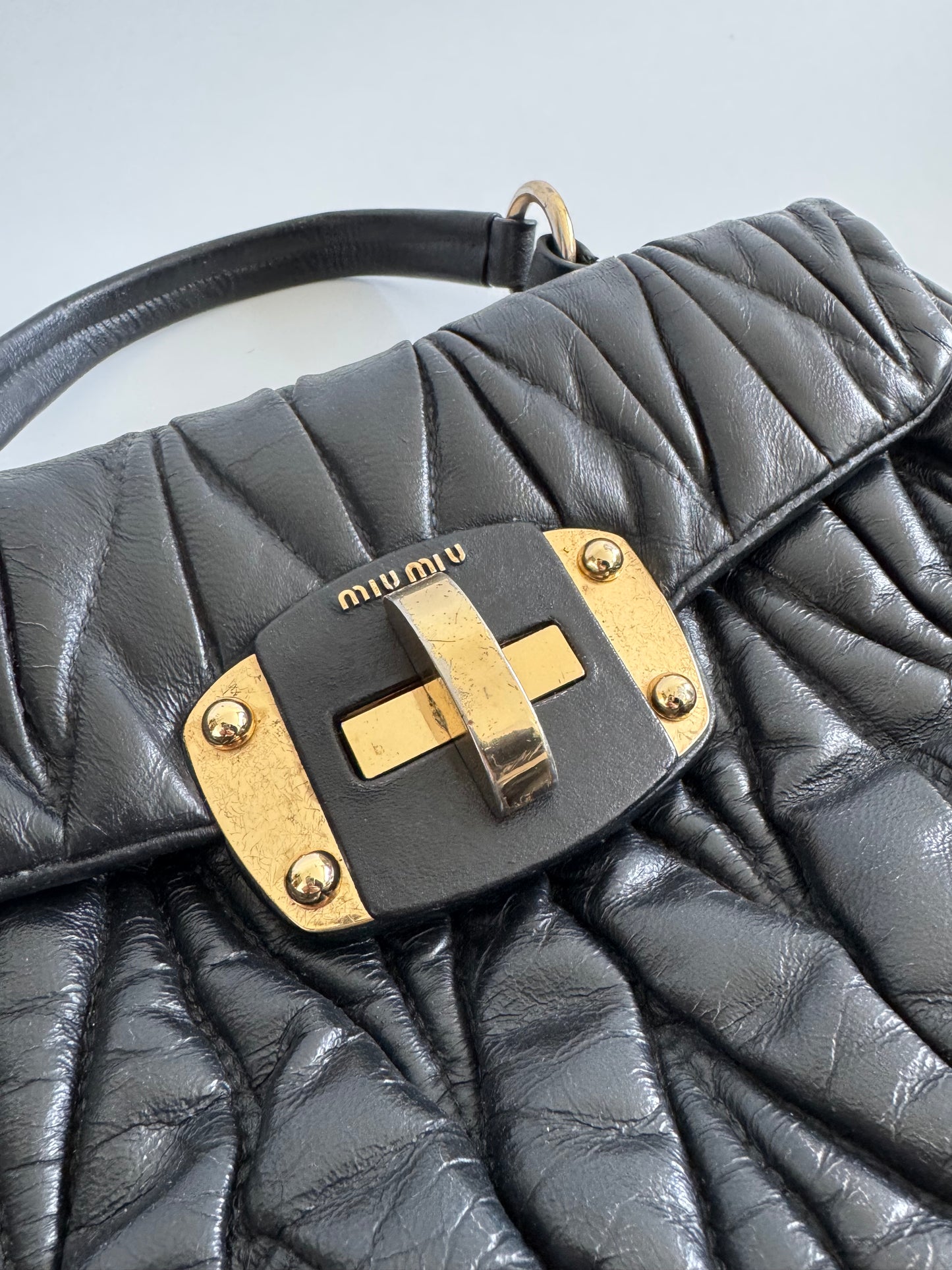 Miu Miu black matelassé crossbody