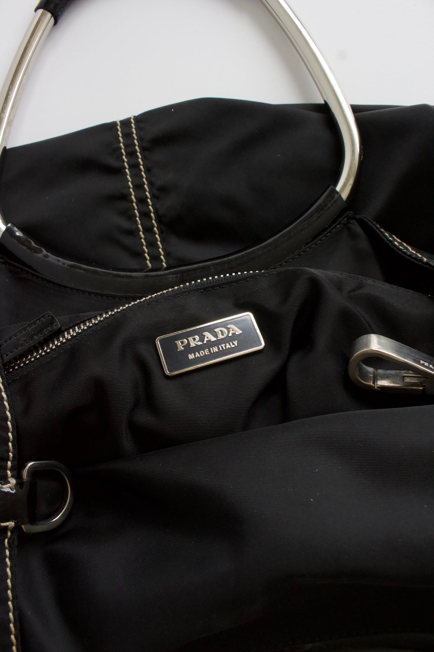 Prada SS 2003 black nylon shoulder bag with metal handle