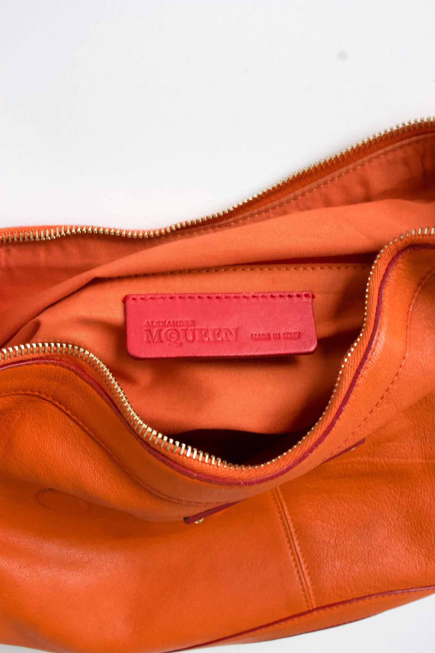 Alexander McQueen SS 2010 De Manta red & orange leather clutch