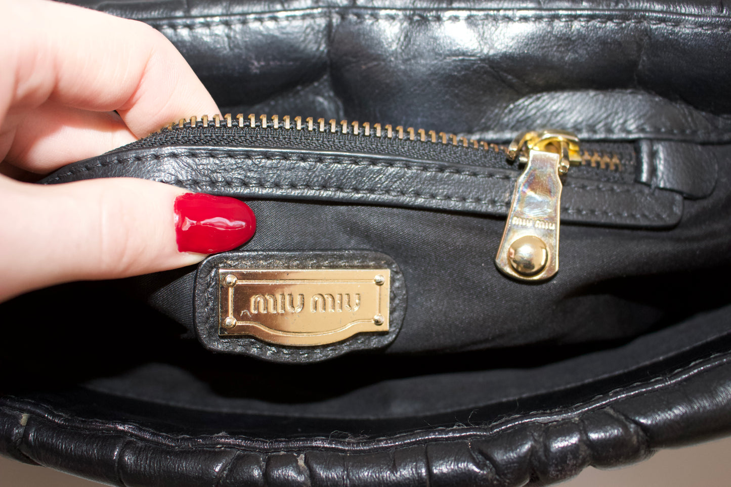 Miu Miu black matelassé crossbody