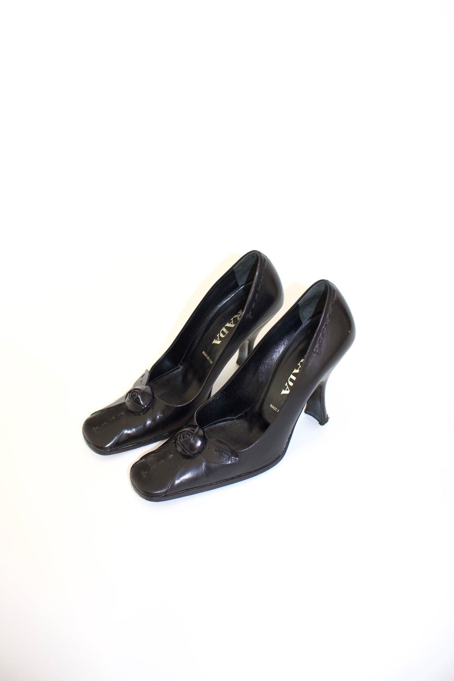Prada FW 2003 black heels with flower detail