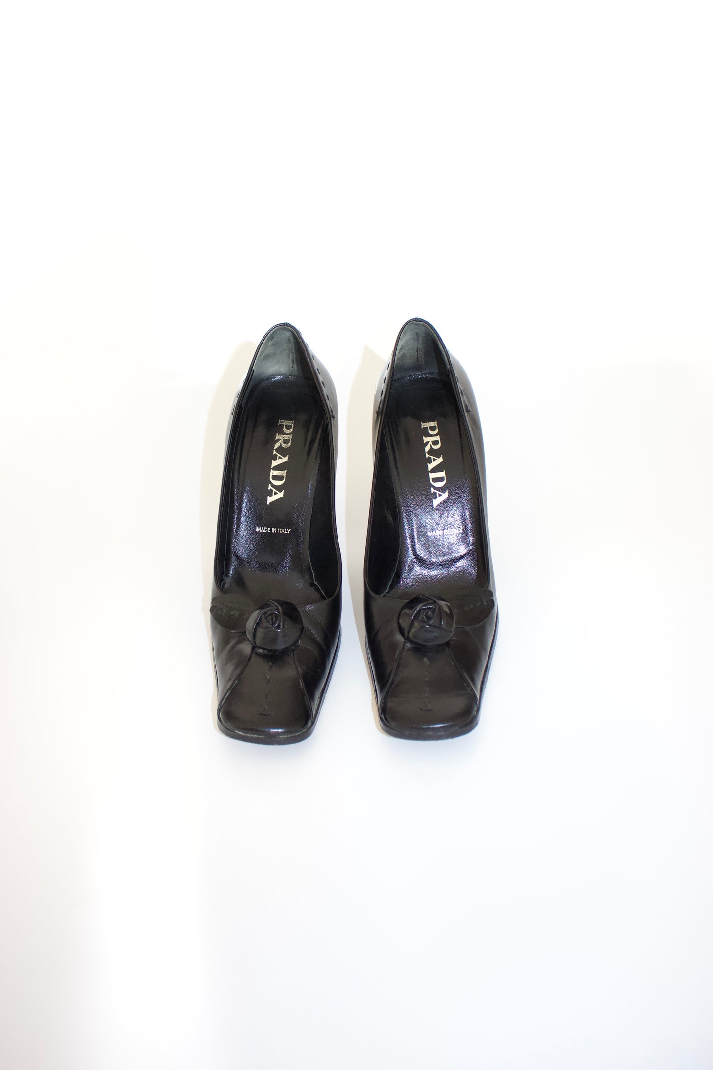 Prada FW 2003 black heels with flower detail