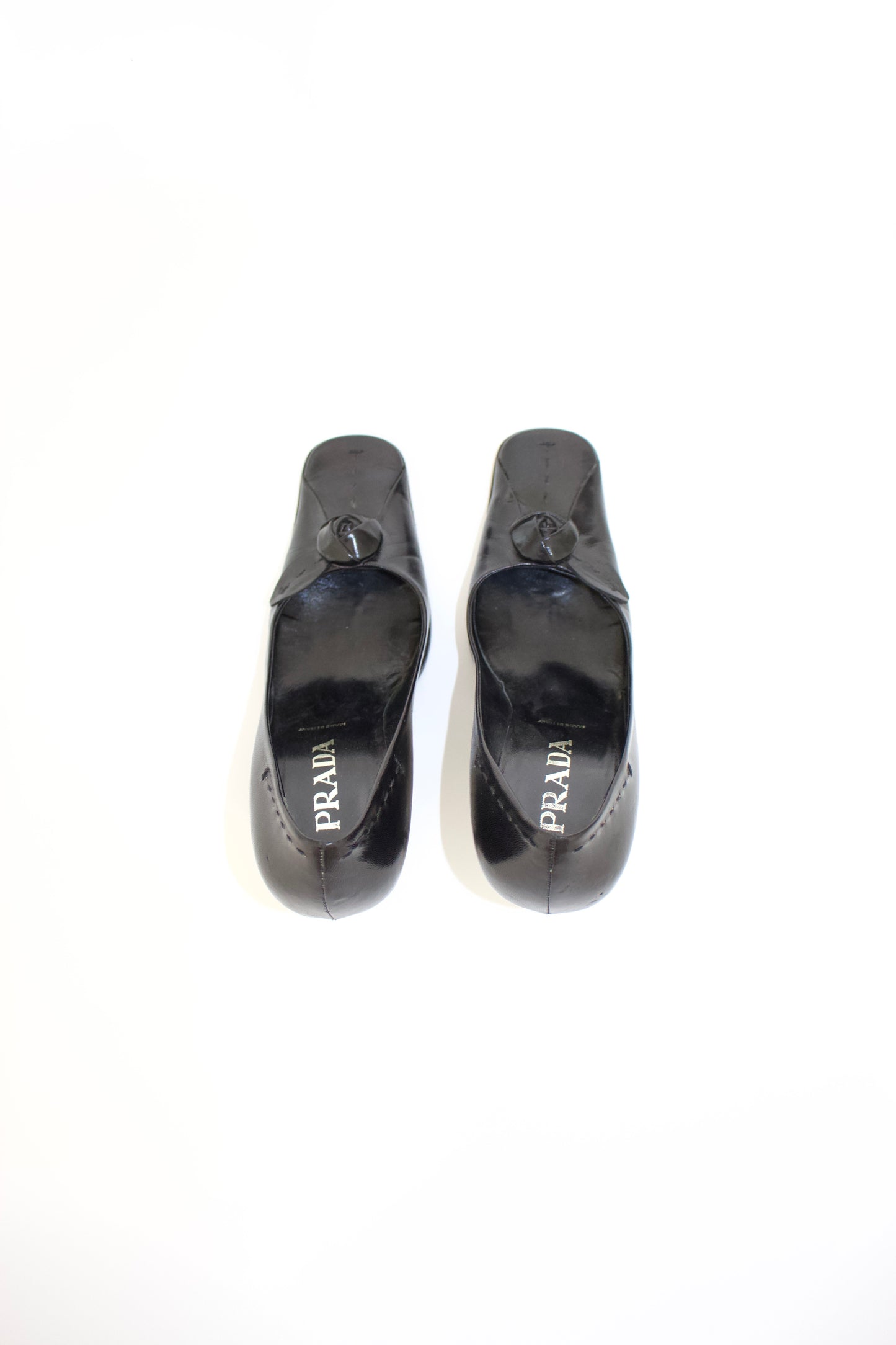 Prada FW 2003 black heels with flower detail