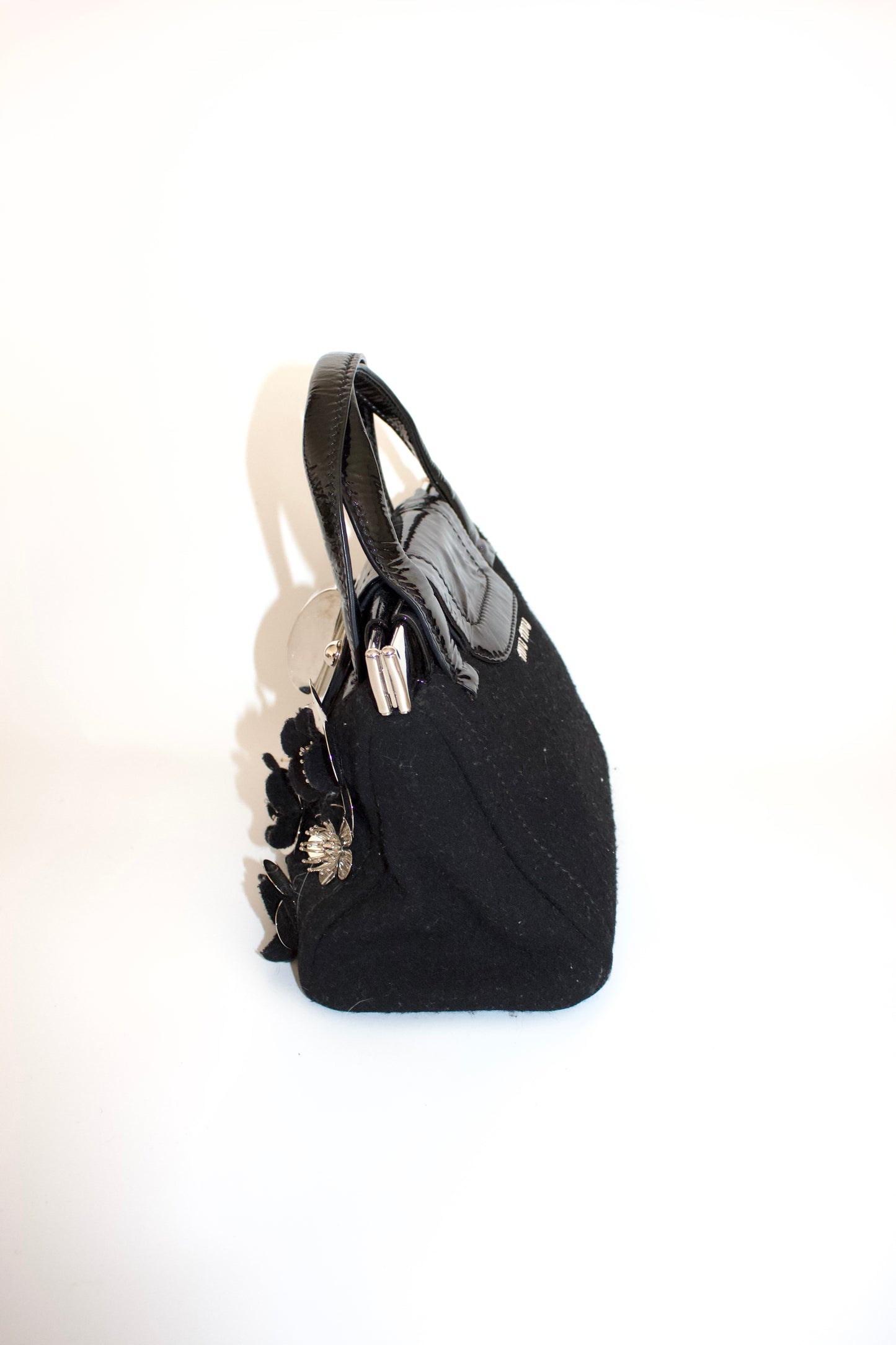 Miu Miu FW2010 black handbag with metallic flowers