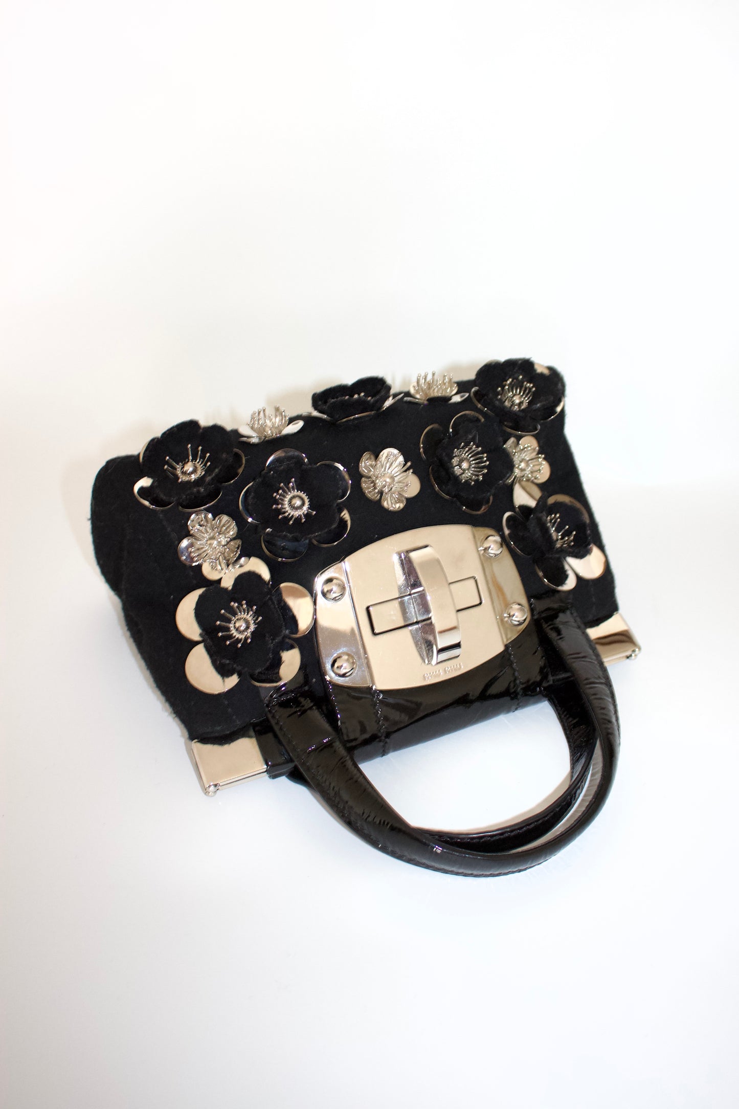 Miu Miu FW2010 black handbag with metallic flowers