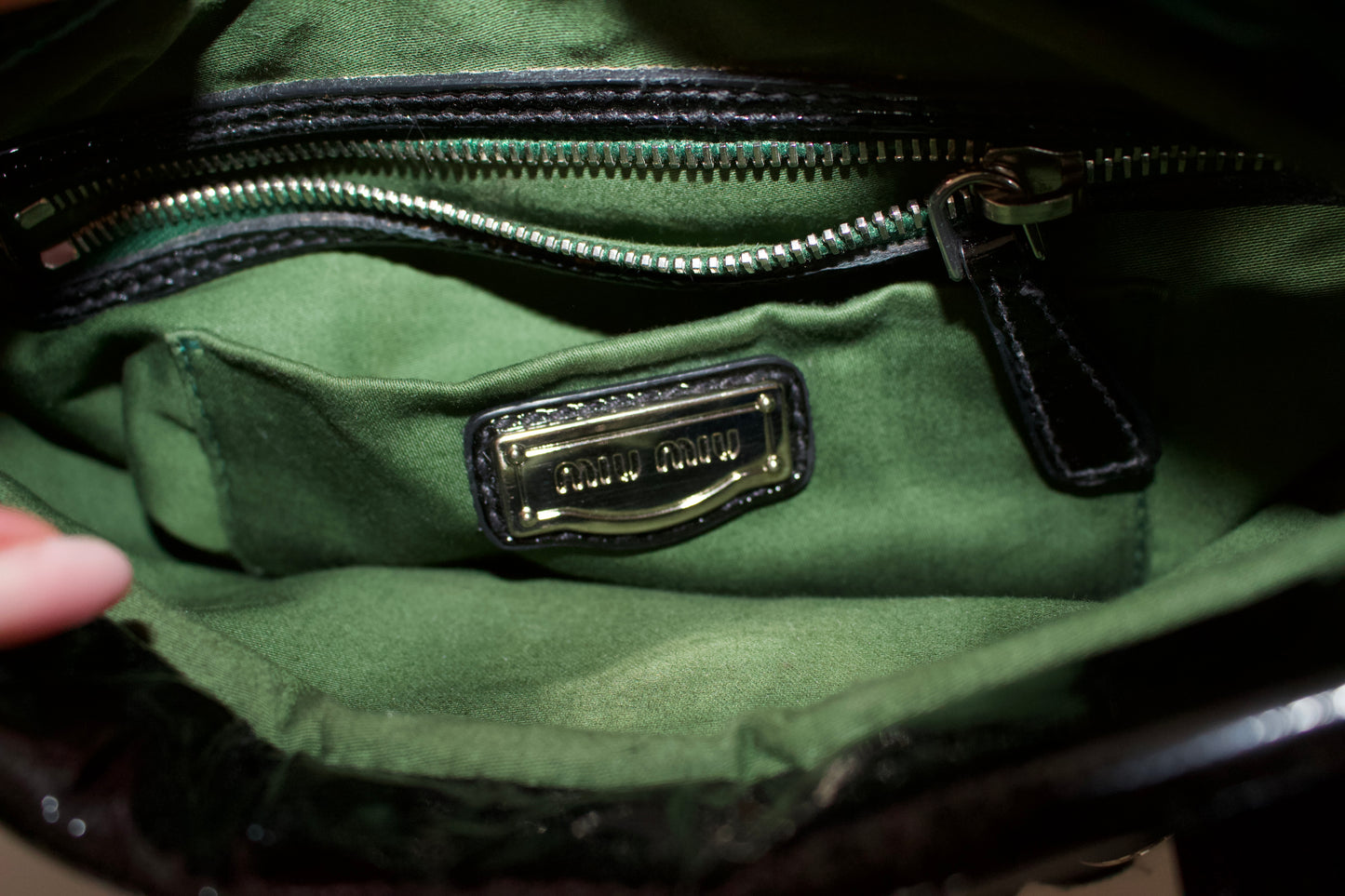 Miu Miu FW2010 black handbag with metallic flowers