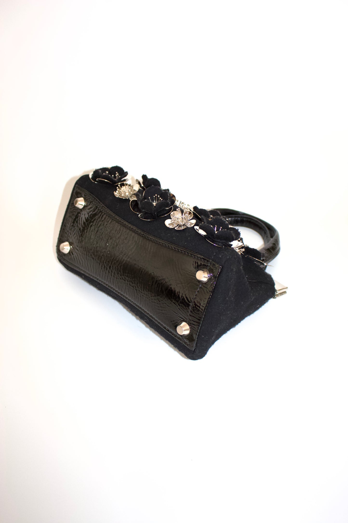 Miu Miu FW2010 black handbag with metallic flowers