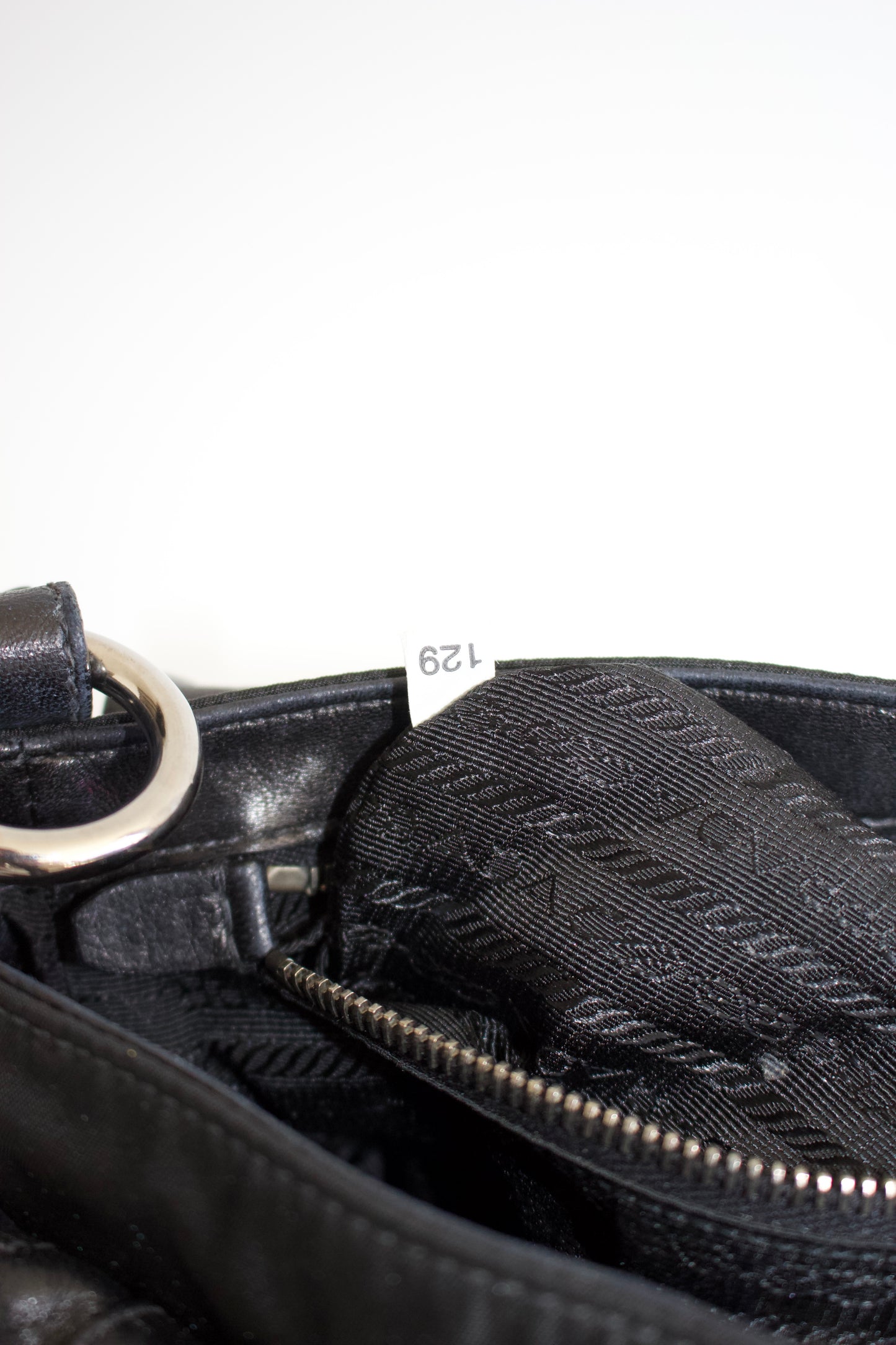 Prada 2000s black nylon & leather baguette