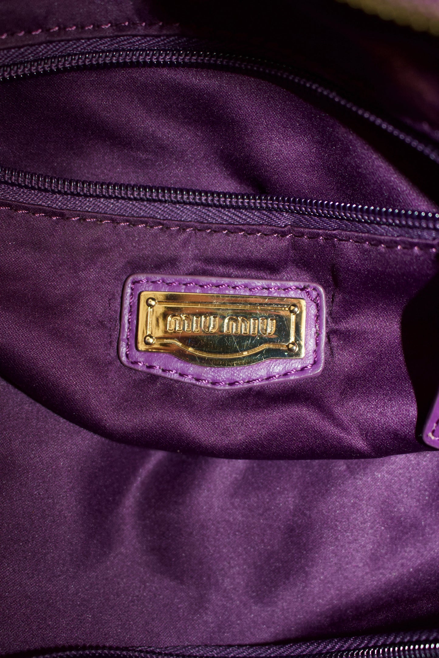 Miu Miu purple woven leather shoulder bag with tassels