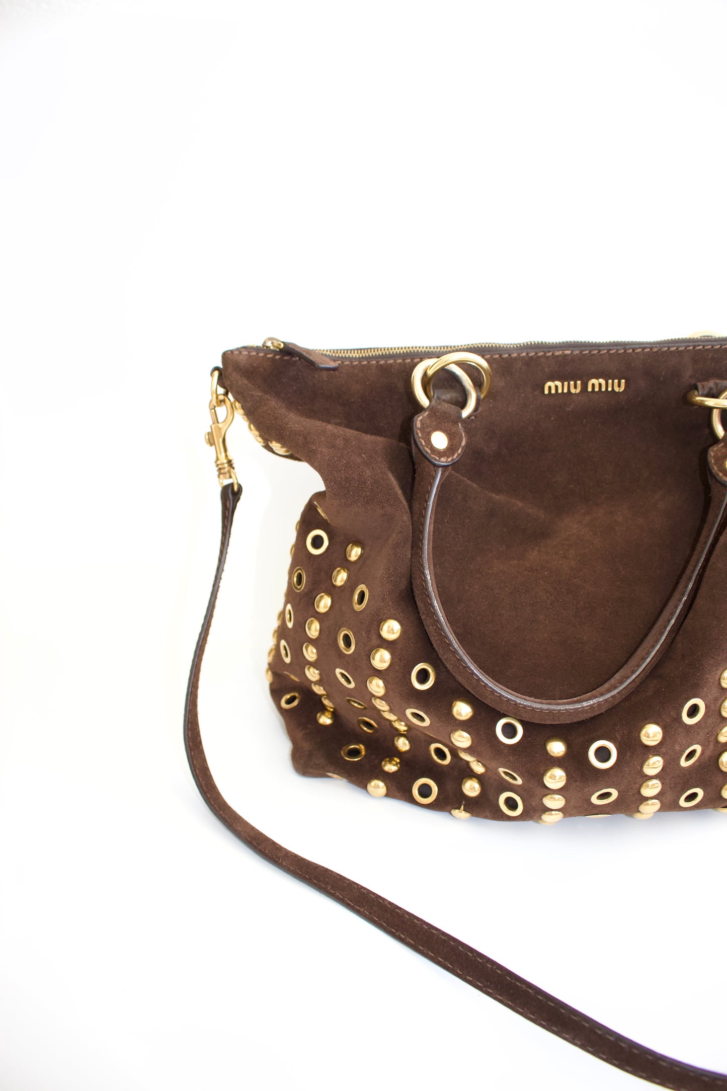 Miu Miu brown suede bag with golden eyelets and grommets