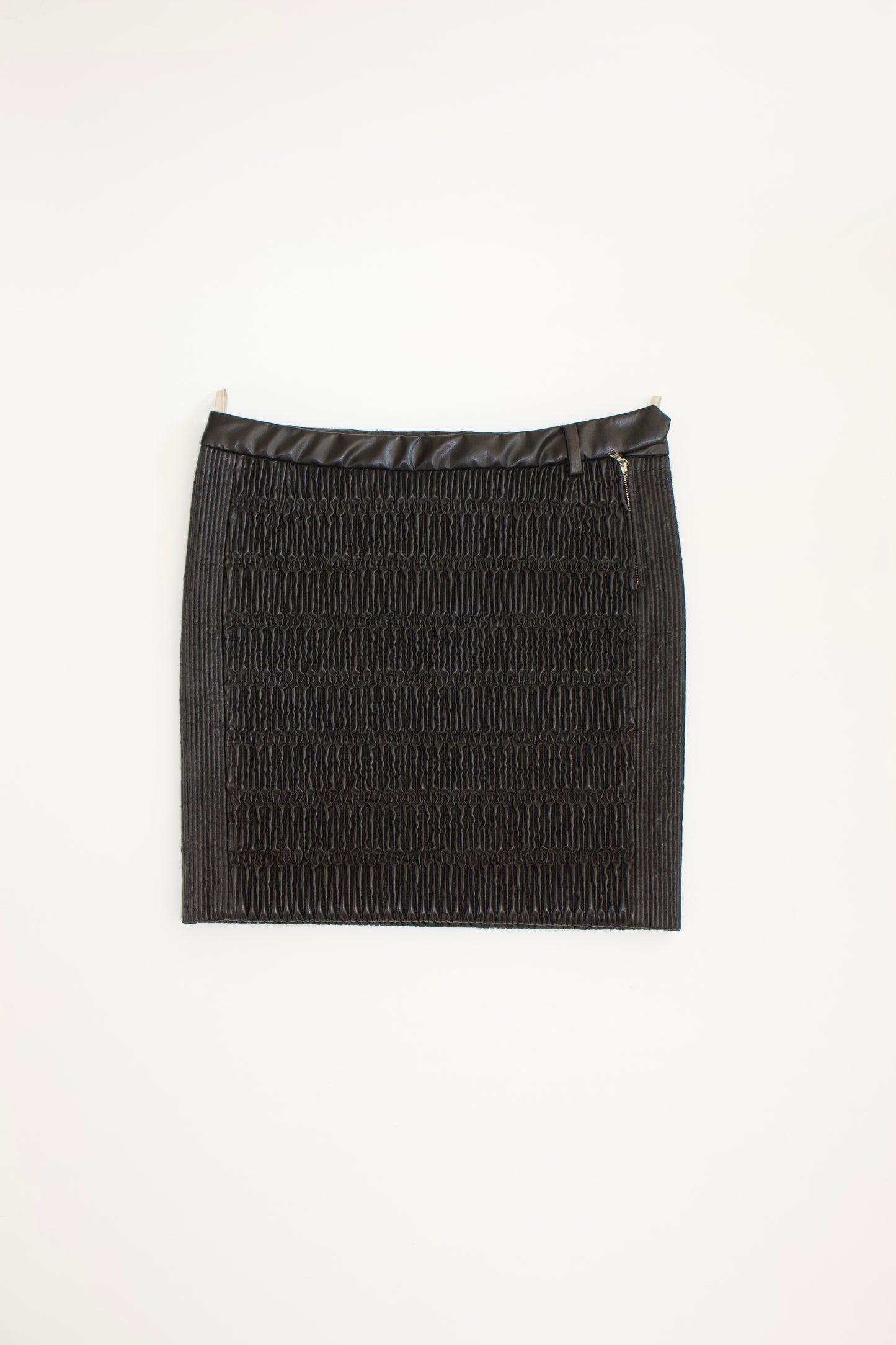 Prada 2000s black matelassé faux leather mini-skirt