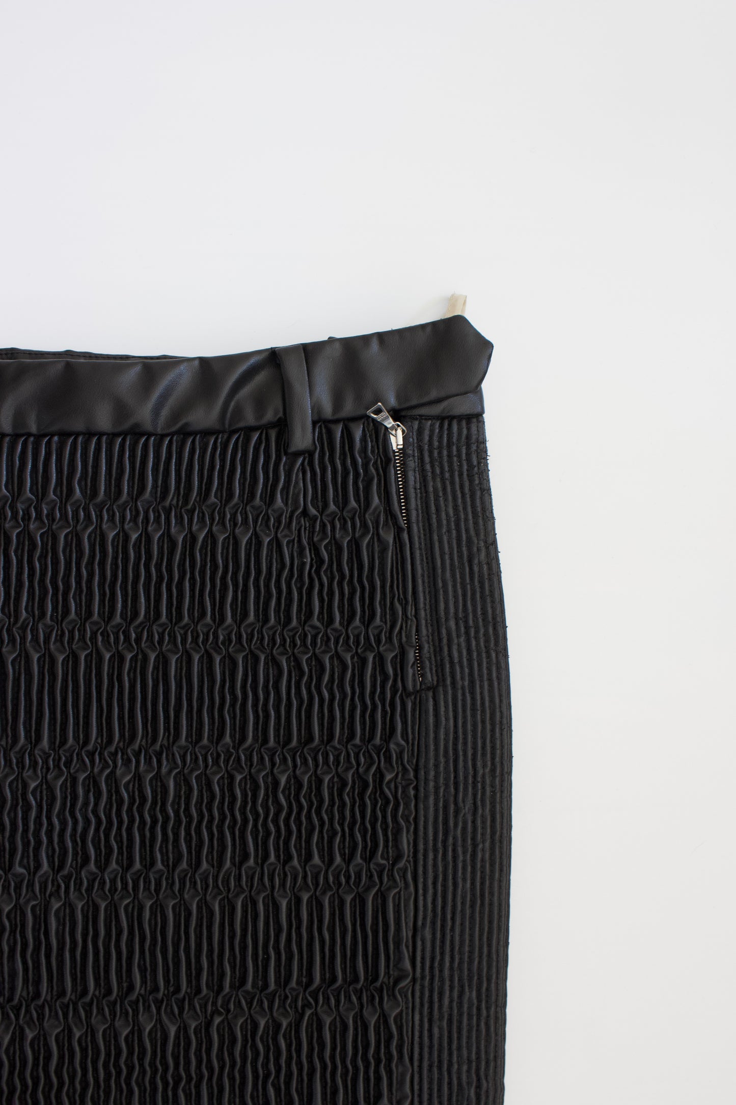 Prada 2000s black matelassé faux leather mini-skirt