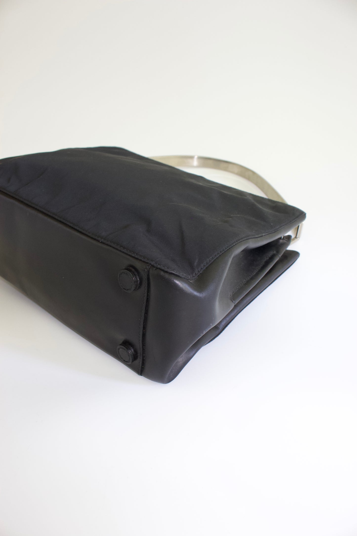 Prada FW 1998 black nylon shoulder bag with metal handle