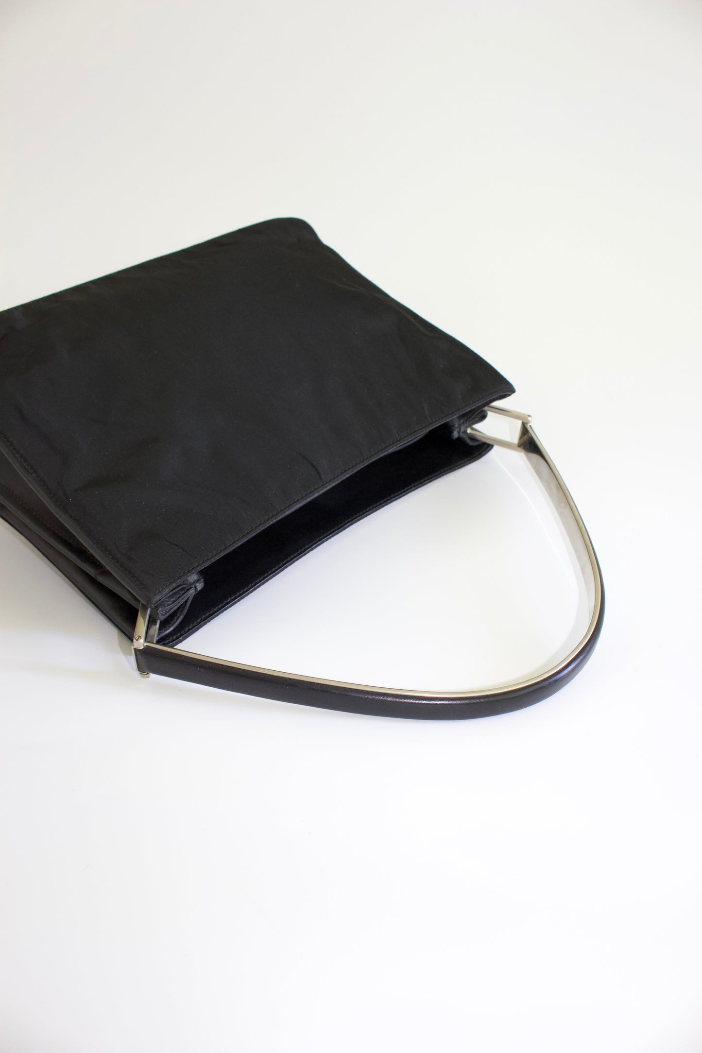 Prada FW 1998 black nylon shoulder bag with metal handle