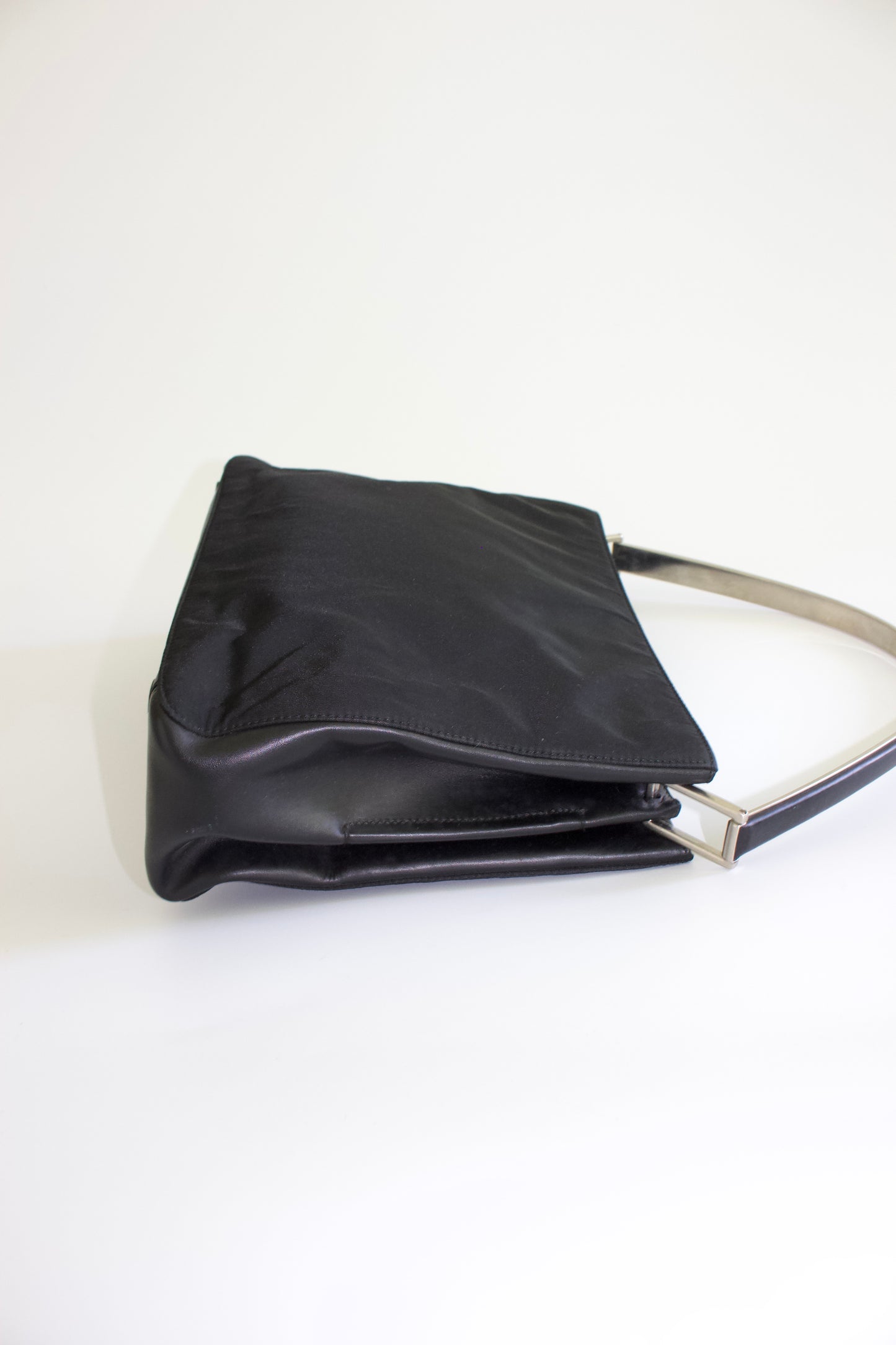 Prada FW 1998 black nylon shoulder bag with metal handle