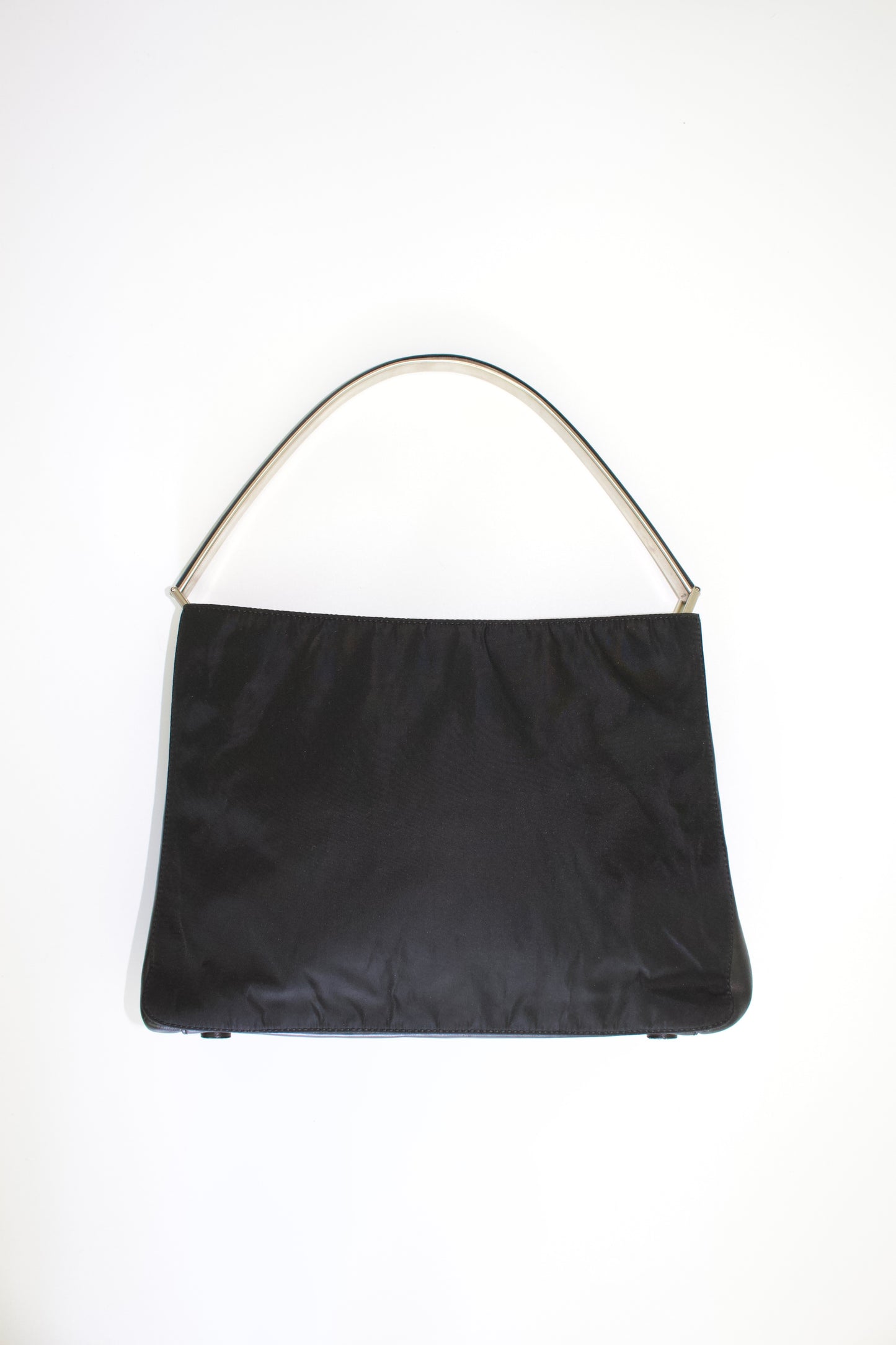 Prada FW 1998 black nylon shoulder bag with metal handle
