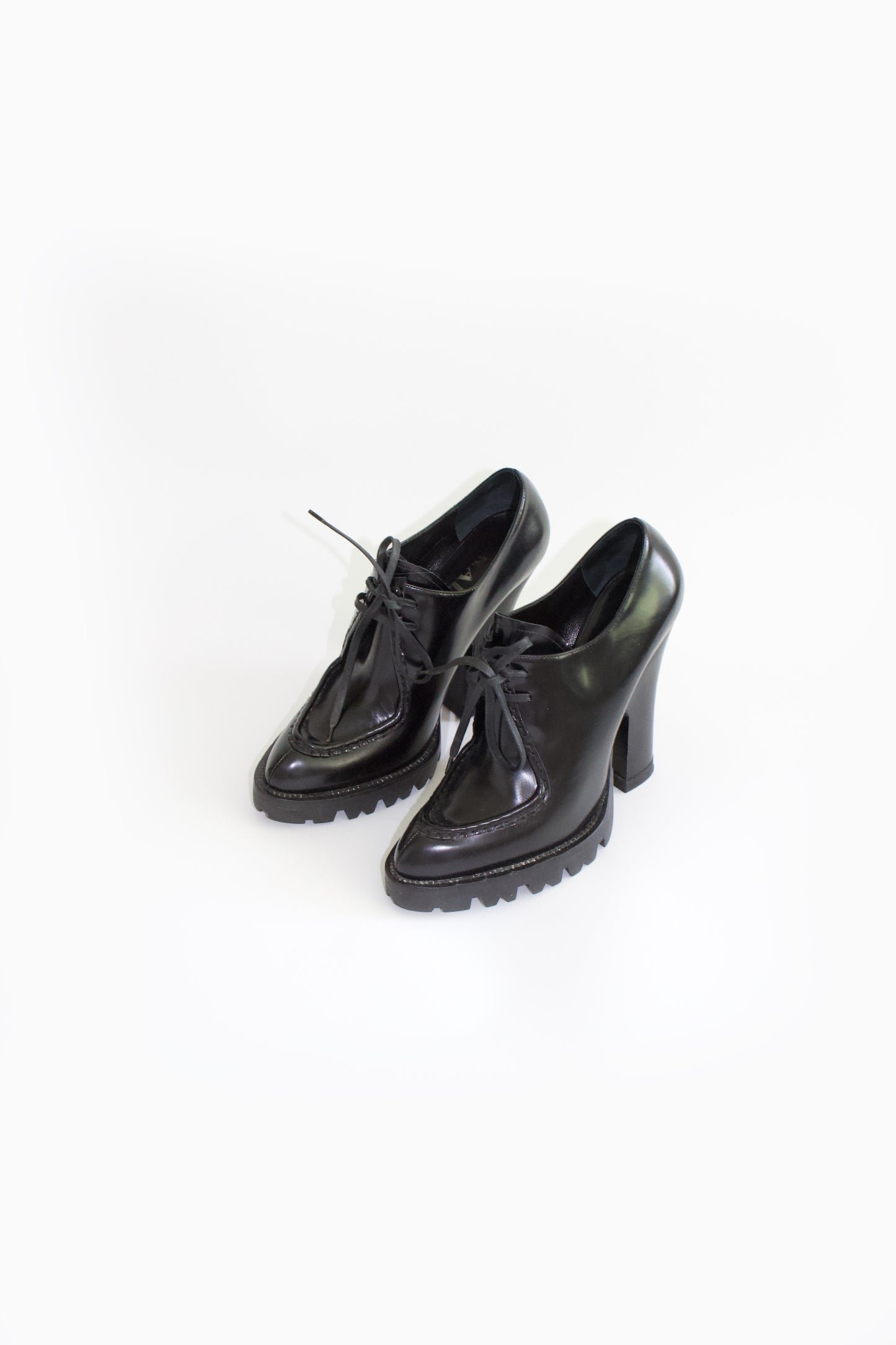 Prada black leather Oxford heels
