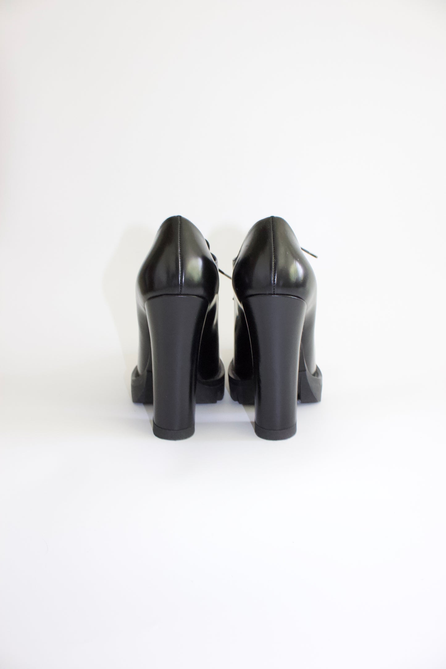 Prada black leather Oxford heels