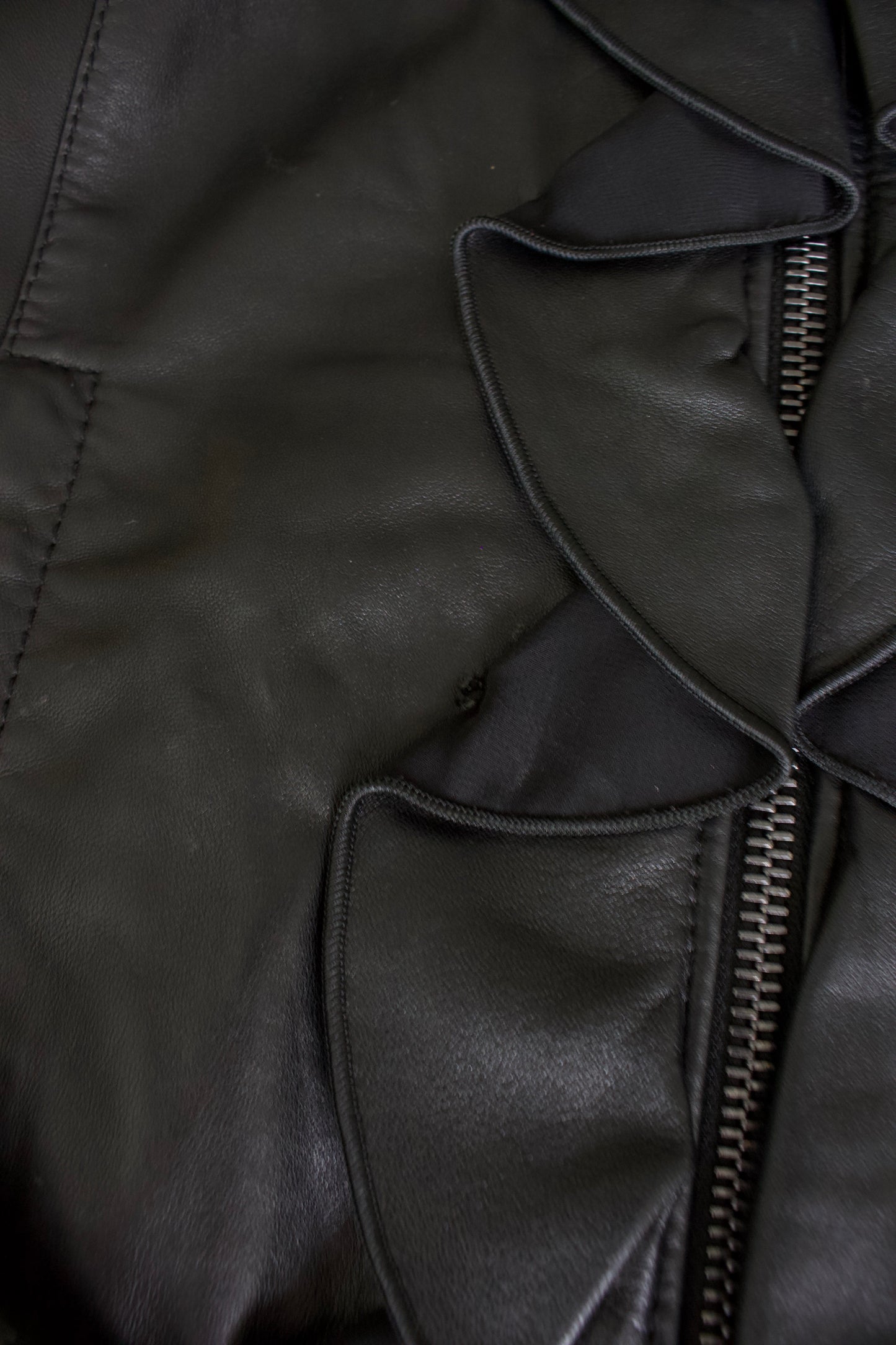 Dolce & Gabbana black leather jacket with ruffles