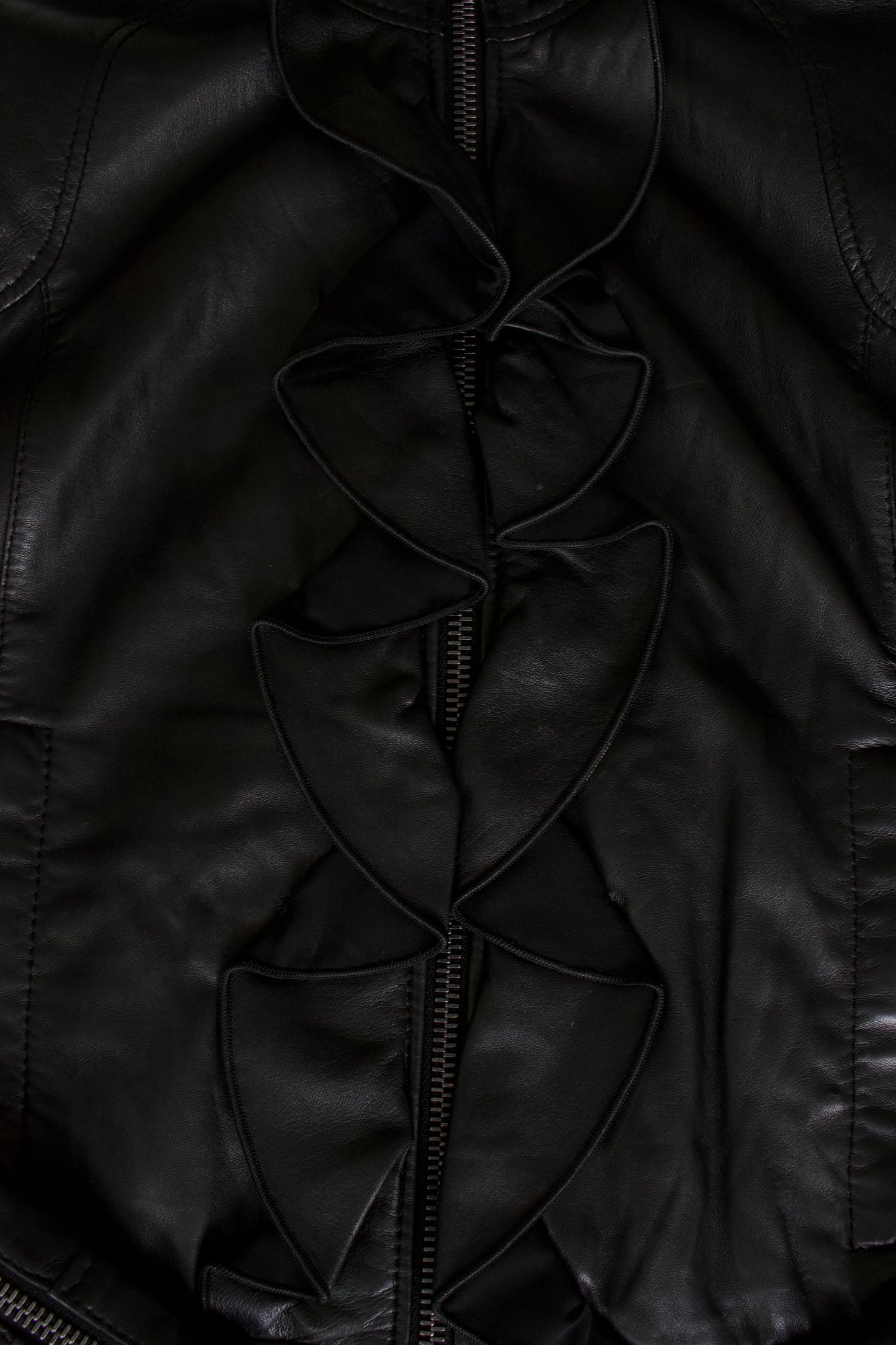 Dolce & Gabbana black leather jacket with ruffles
