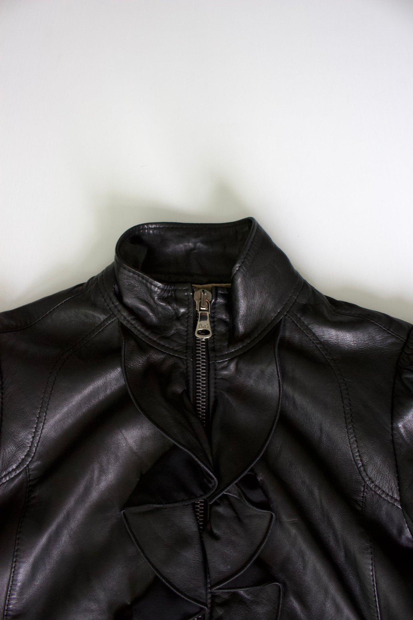 Dolce & Gabbana black leather jacket with ruffles