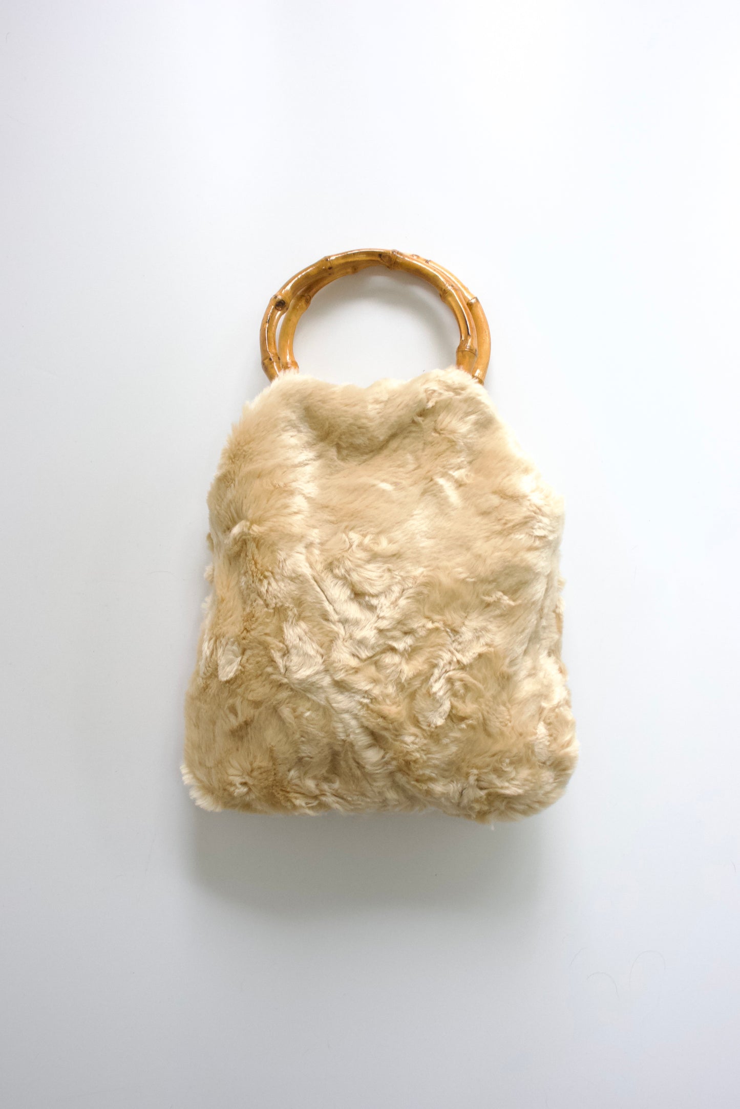La Perla cream fur bag with bambo handles