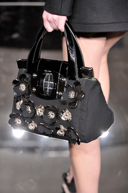 Miu Miu FW2010 black handbag with metallic flowers