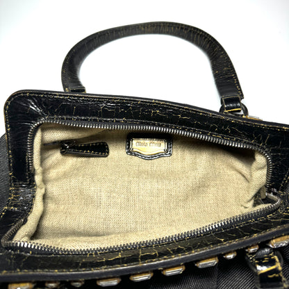 Miu Miu denim handbag with jewels and cracked leather handles