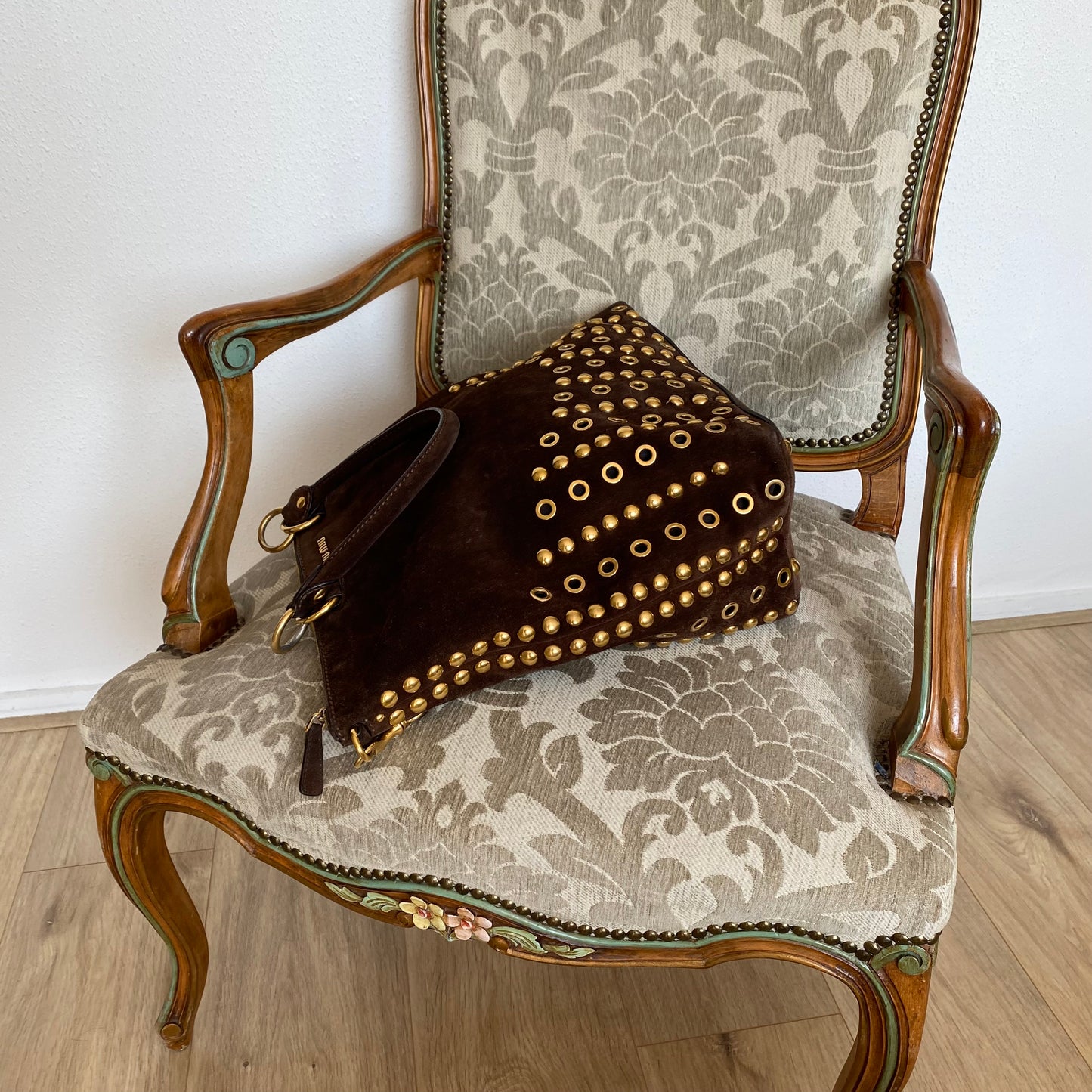 Miu Miu brown suede bag with golden eyelets and grommets