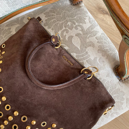 Miu Miu brown suede bag with golden eyelets and grommets