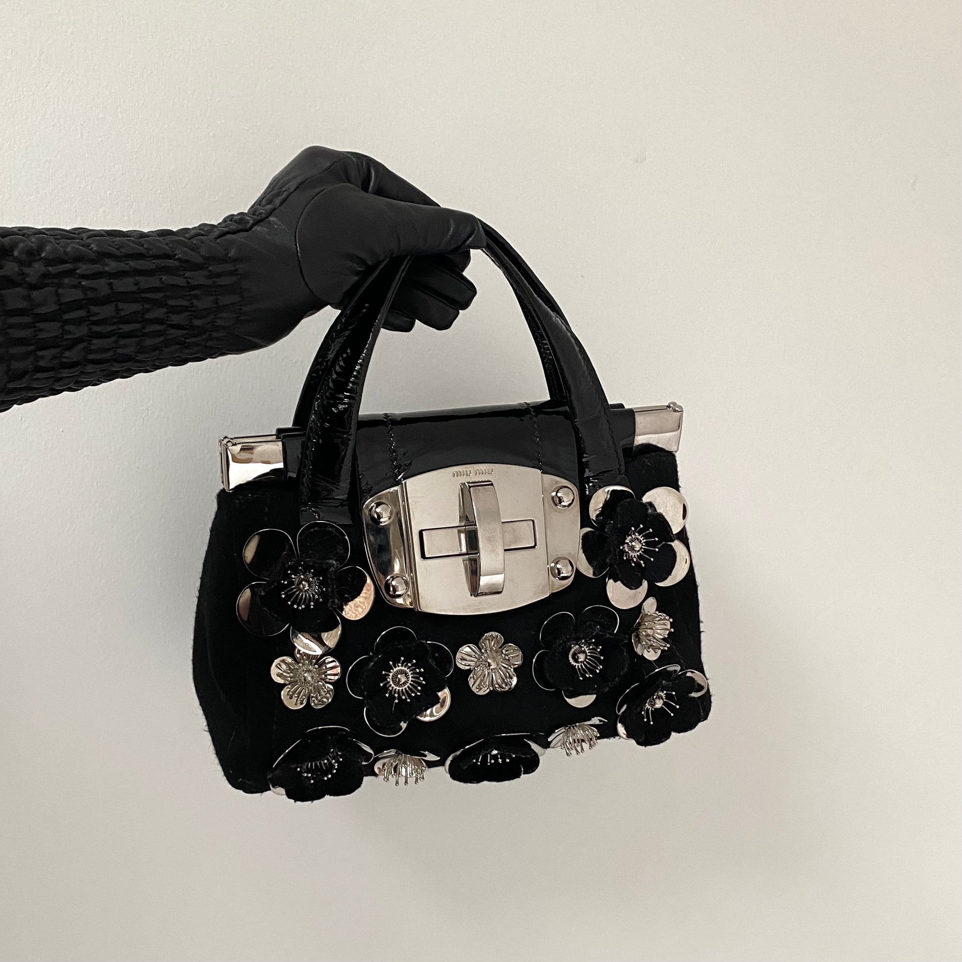 Miu Miu FW2010 black handbag with metallic flowers – Velvet Archive 