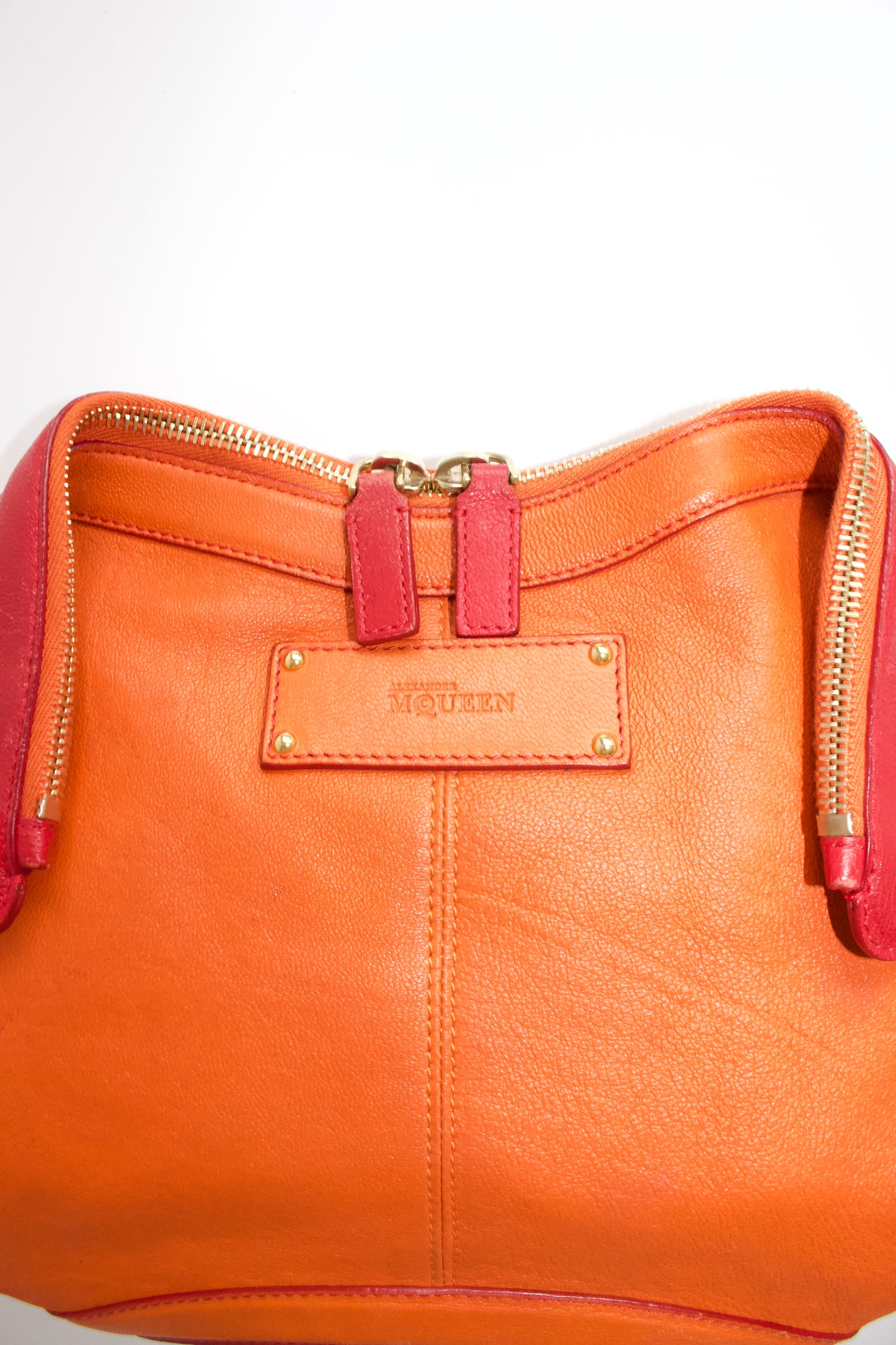 Alexander McQueen SS 2010 De Manta red & orange leather clutch