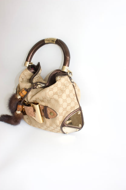 Gucci Indy brown monogram bag with mink fur tassels
