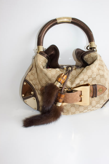 Gucci Indy brown monogram bag with mink fur tassels