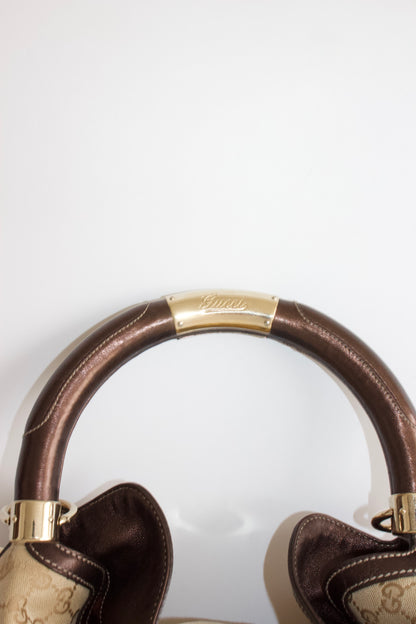 Gucci Indy brown monogram bag with mink fur tassels