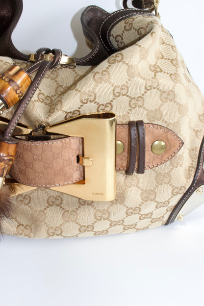Gucci Indy brown monogram bag with mink fur tassels