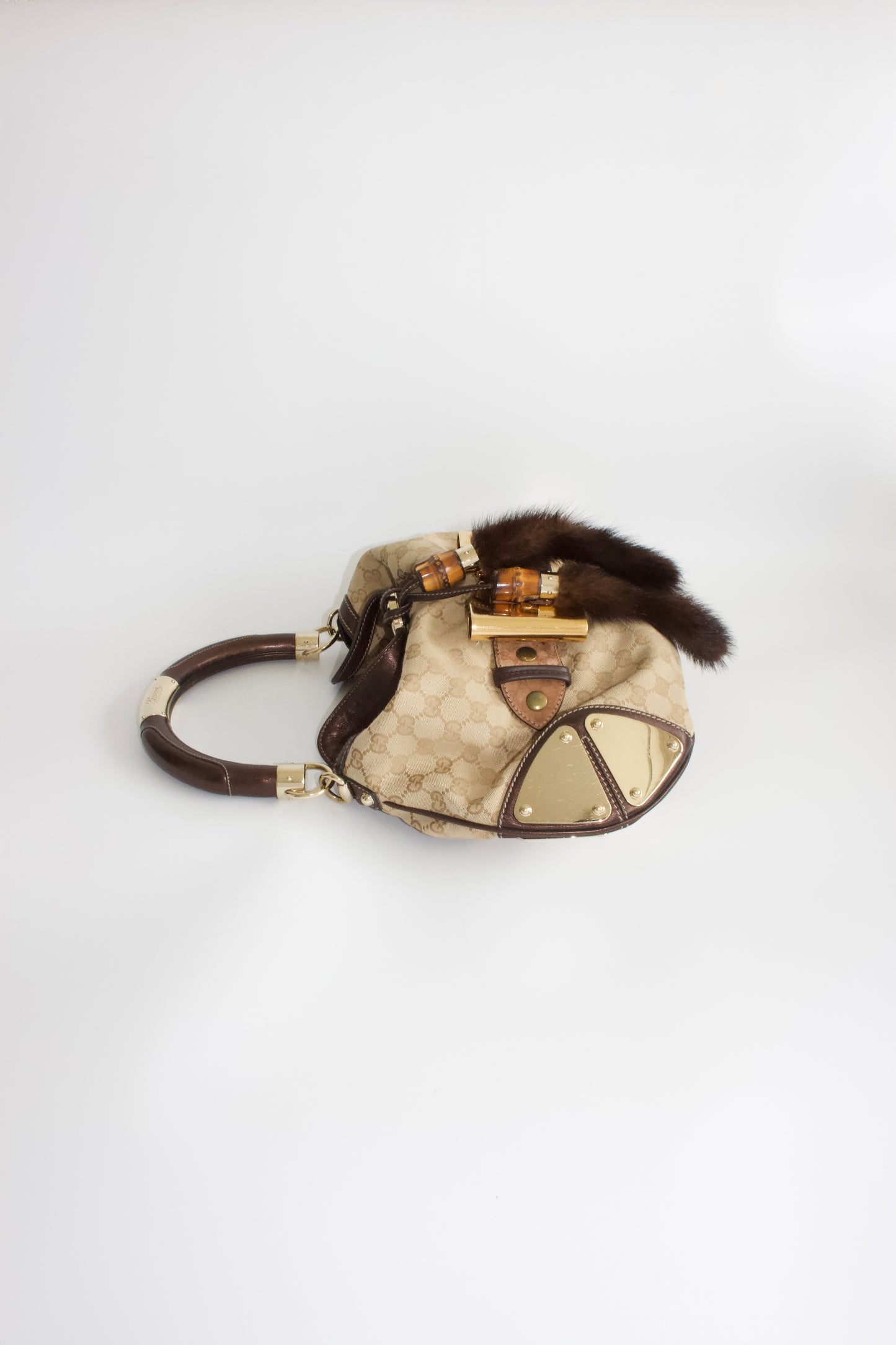Gucci Indy brown monogram bag with mink fur tassels