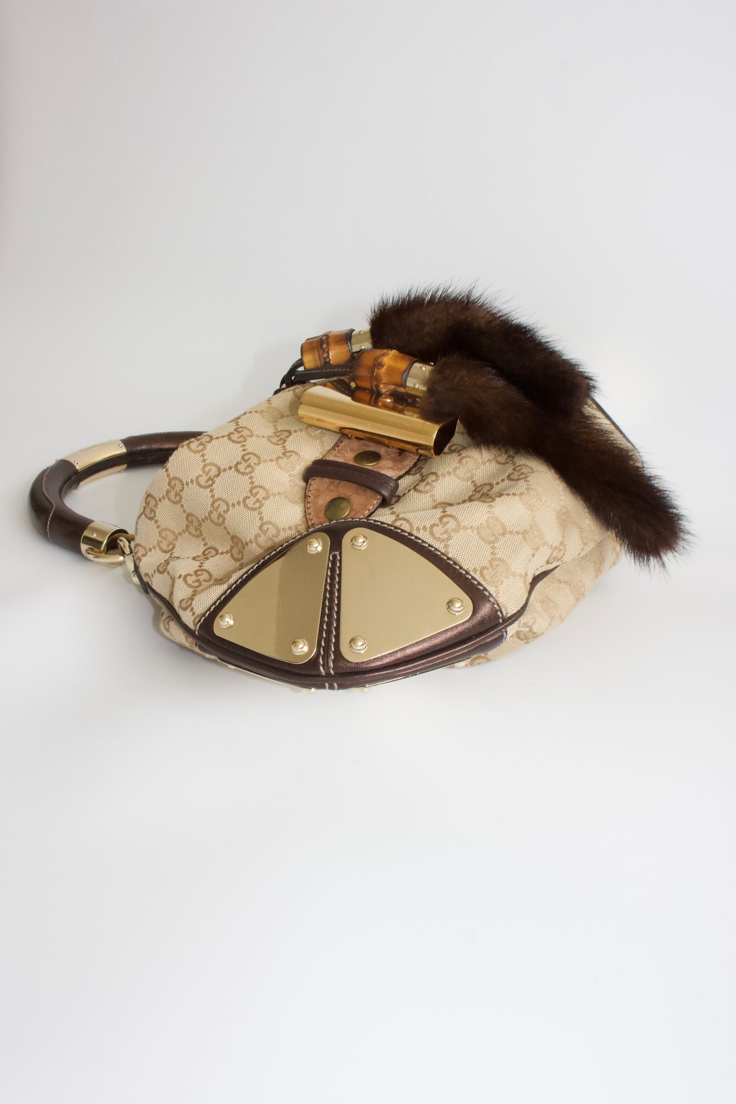 Gucci Indy brown monogram bag with mink fur tassels