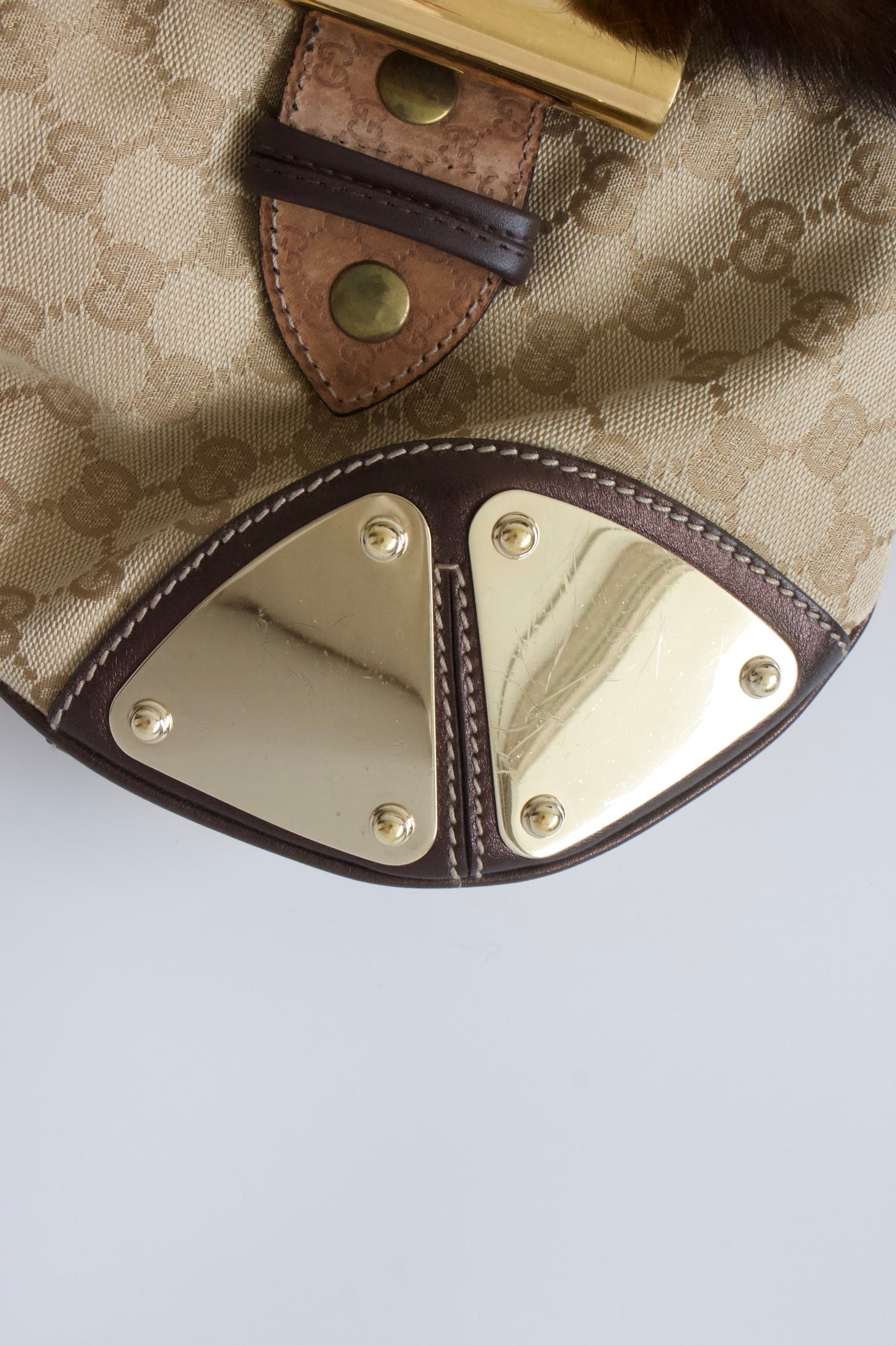 Gucci Indy brown monogram bag with mink fur tassels