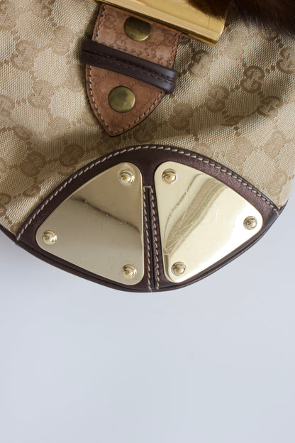 Gucci Indy brown monogram bag with mink fur tassels