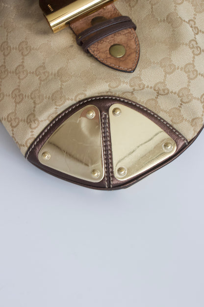 Gucci Indy brown monogram bag with mink fur tassels