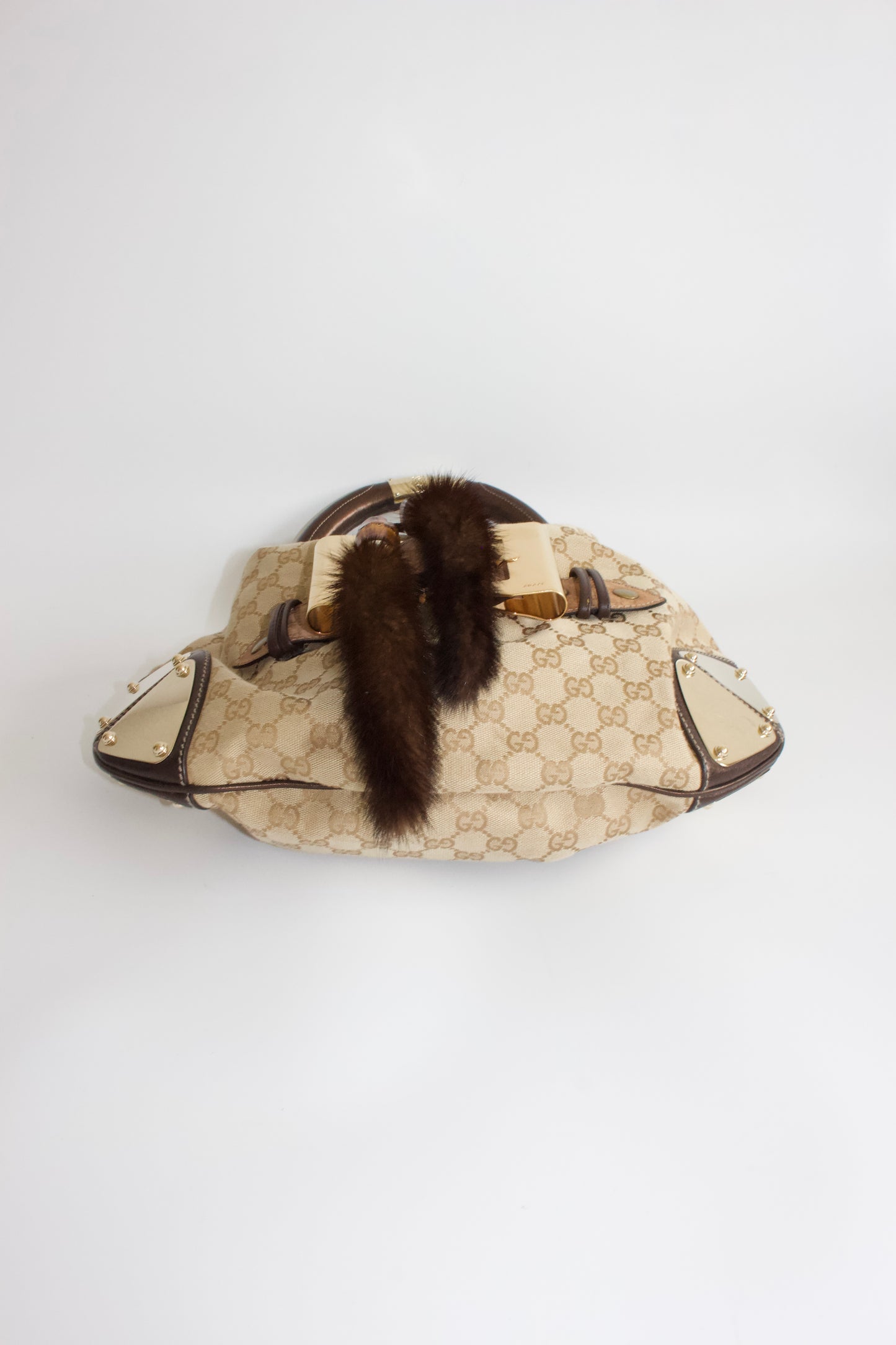 Gucci Indy brown monogram bag with mink fur tassels
