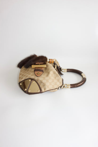 Gucci Indy brown monogram bag with mink fur tassels