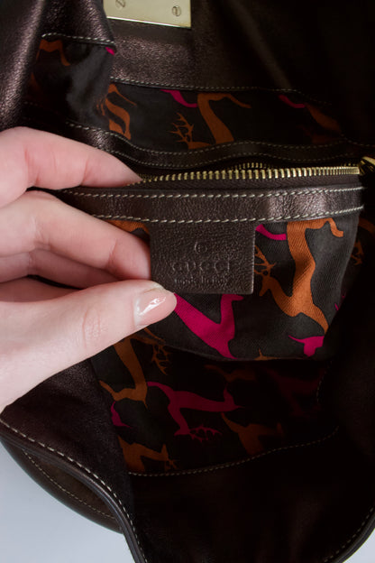 Gucci Indy brown monogram bag with mink fur tassels