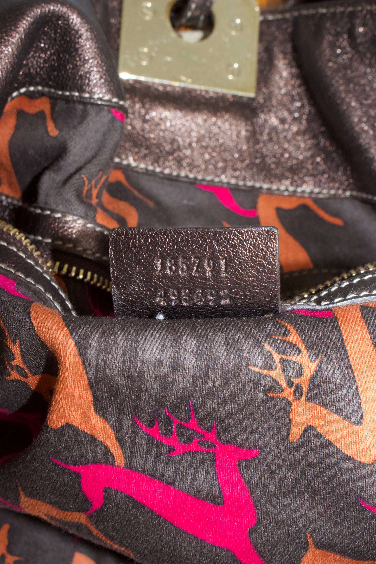 Gucci Indy brown monogram bag with mink fur tassels