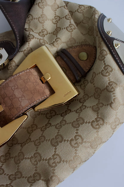 Gucci Indy brown monogram bag with mink fur tassels