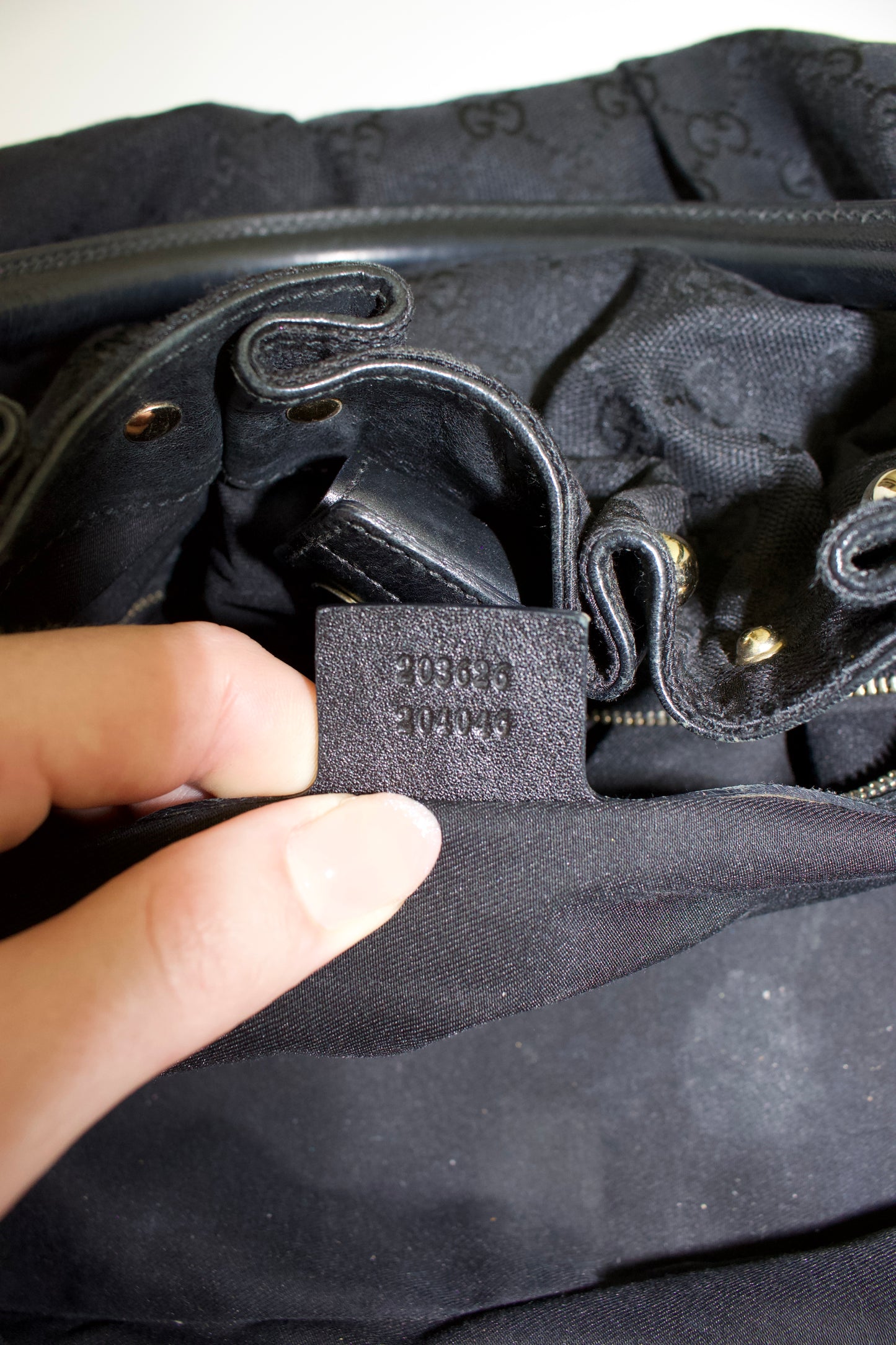Gucci black GG canvas studded Pelham bag