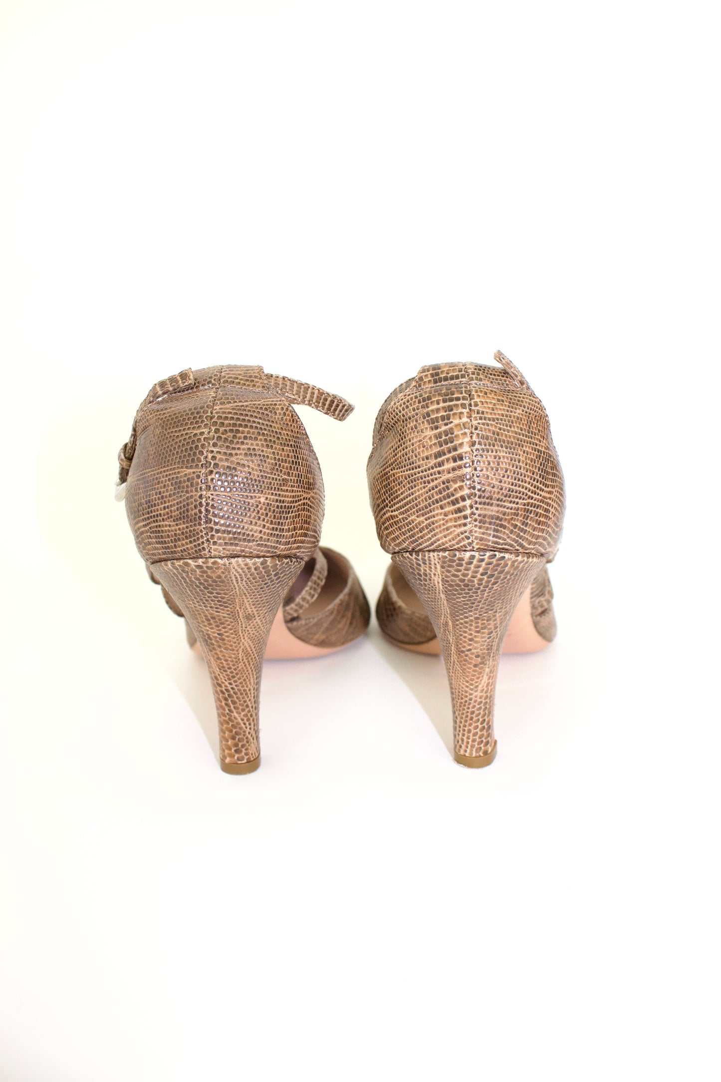 Prada 2000s snakeskin heels with flower details