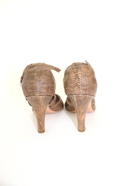 Prada 2000s snakeskin heels with flower details