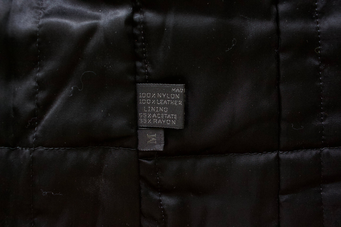 Prada FW 1995 black nylon & leather vest jacket with fur